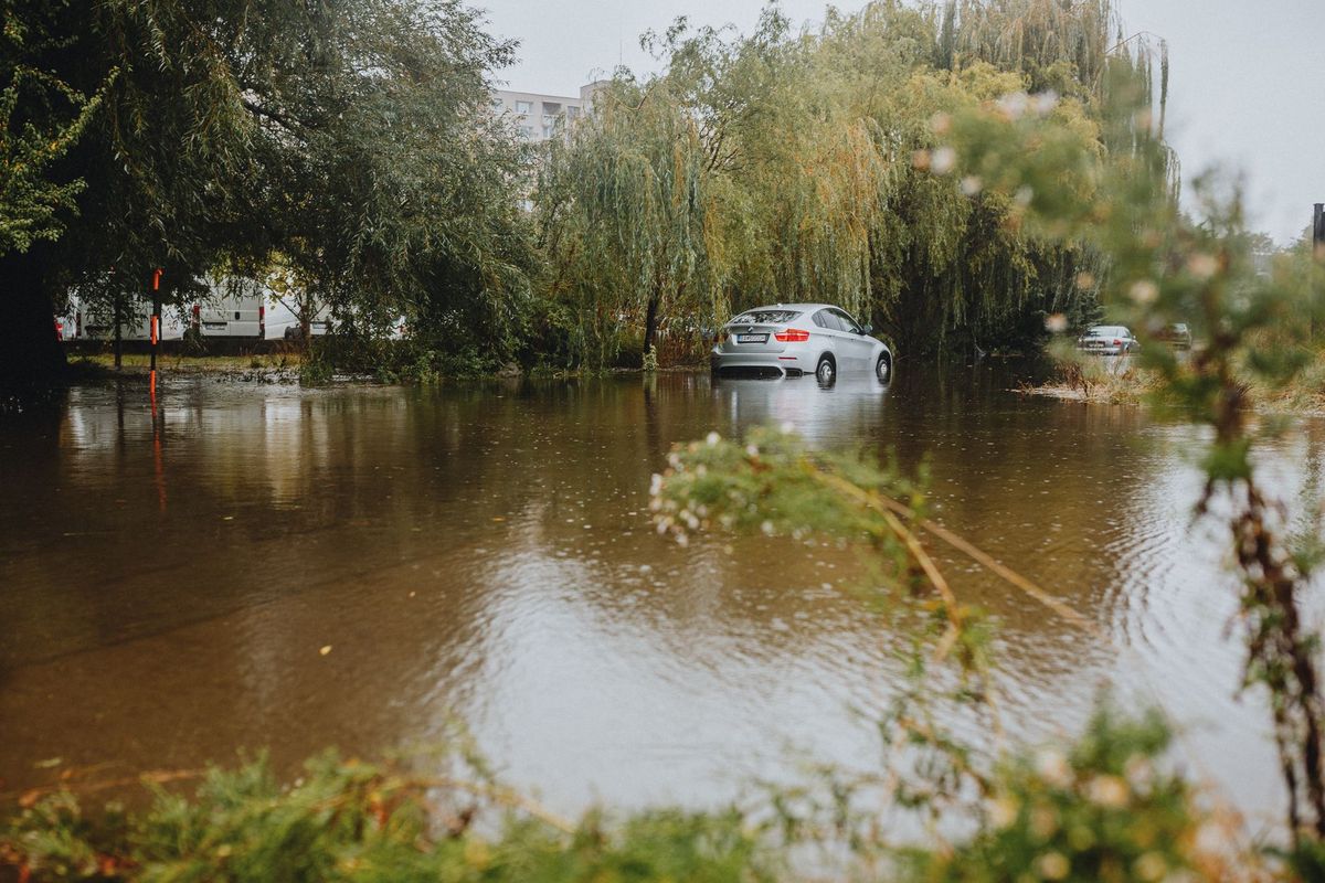 Heavy rain and flooding in north-central Japan strands people and vehicles
